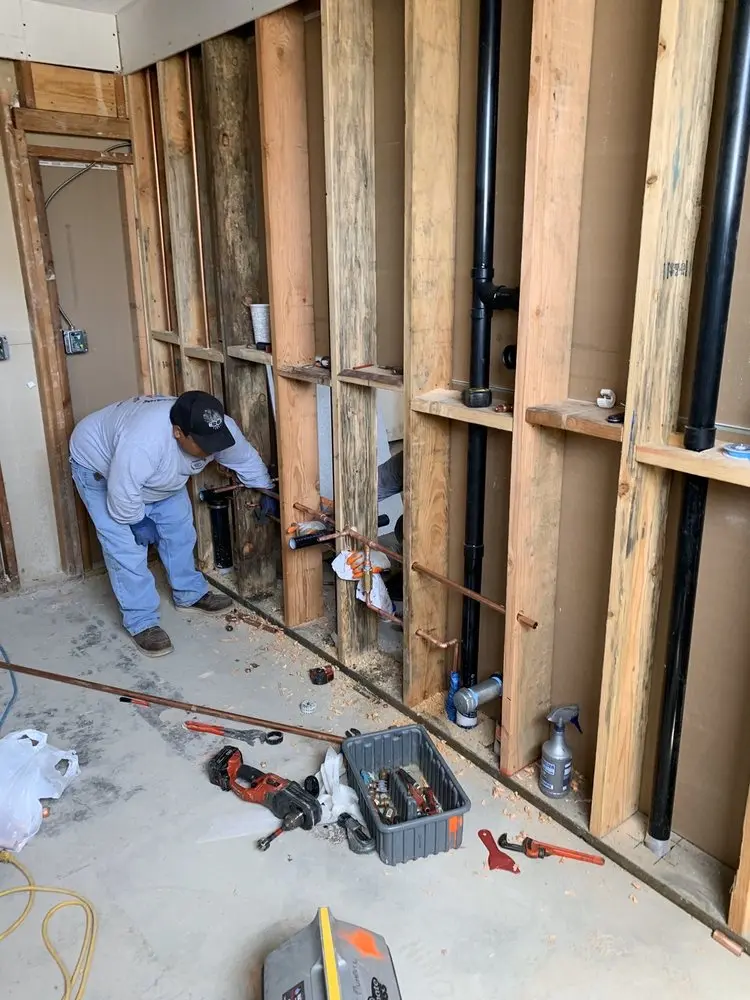 Commercial rough-in plumbing for Water Heater Replacement in Breezewood Estates